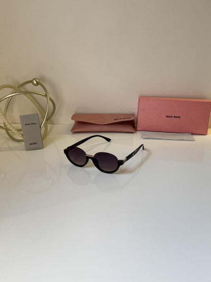MIU MIU GLASSES