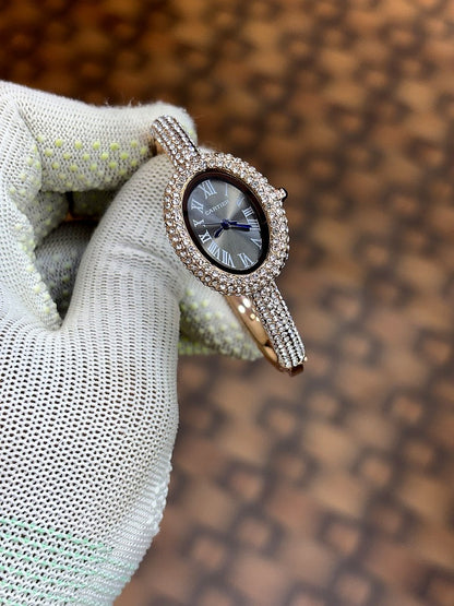 Cartier Baignoire watch in 18k rose gold with a diamond set bezel and bracelet