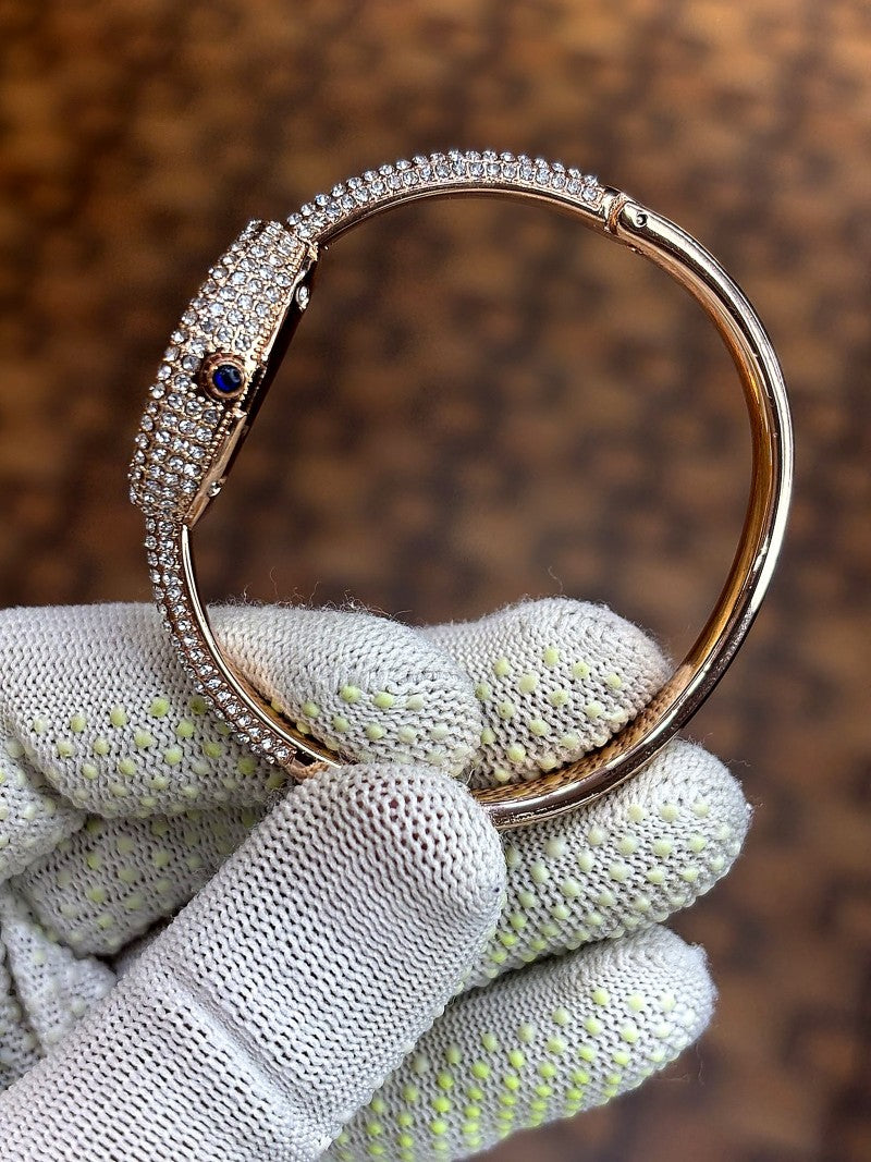 Cartier Baignoire watch in 18k rose gold with a diamond set bezel and bracelet