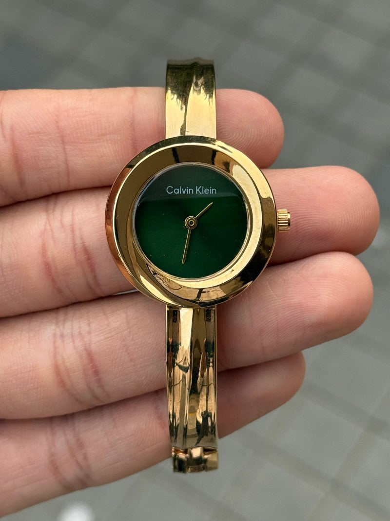 Calvin Klei n Twisted Bezel Women Gold Green