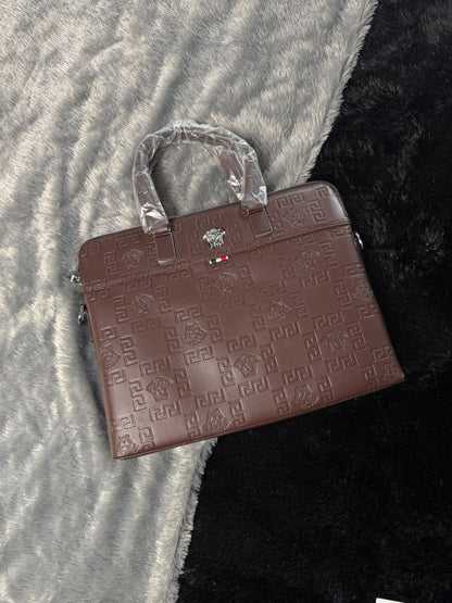 Versace premium laptop bag features an embossed logo Branding