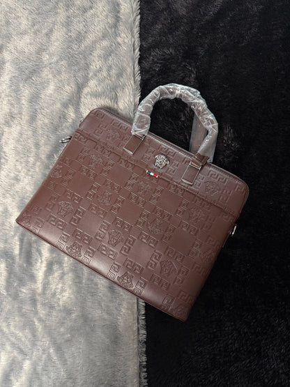 Versace premium laptop bag features an embossed logo Branding