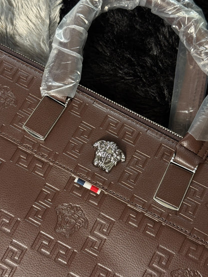 Versace premium laptop bag features an embossed logo Branding