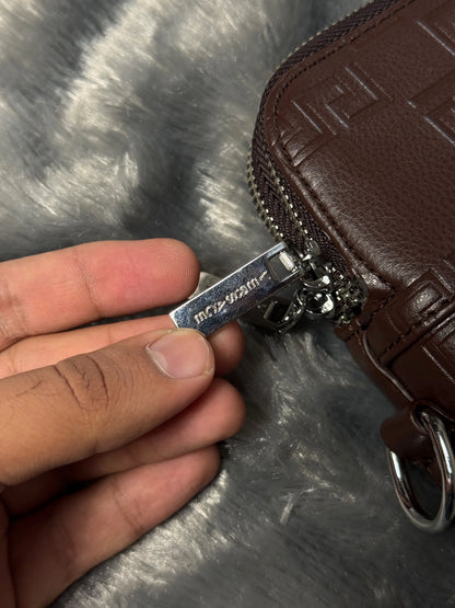 Versace premium laptop bag features an embossed logo Branding
