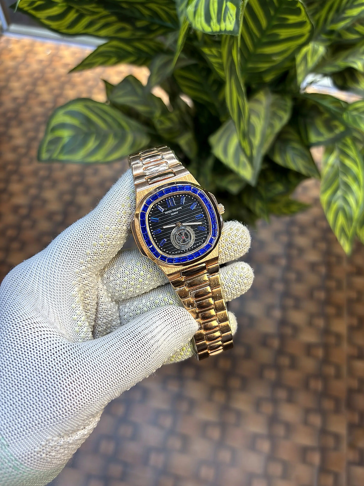 Patek Philippe Nautilus baguette diamond-set bezel.