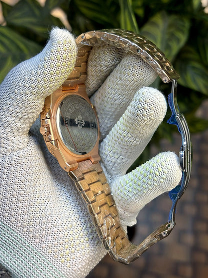 Patek Philippe Nautilus baguette diamond-set bezel.