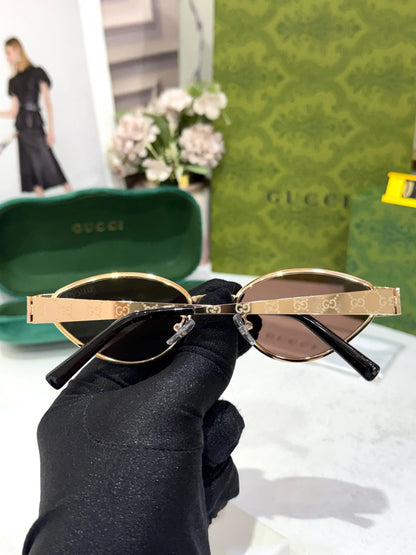 GUCCI DESIGNER GOLD BROWN WITH LOGO DESIGN STICK SHOWROOM MODEL 501