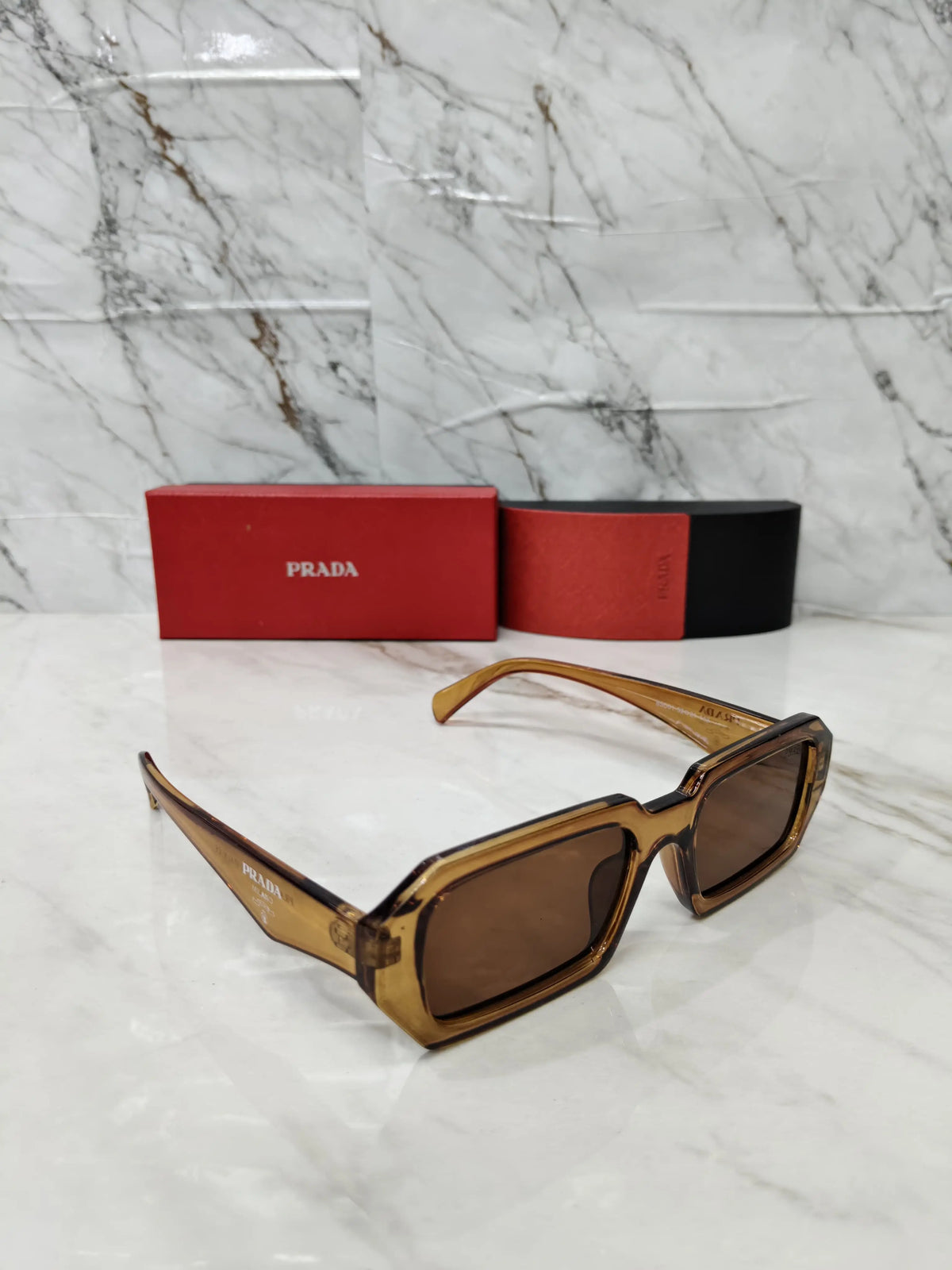 PRADA 01 TRANSPARENT BROWN