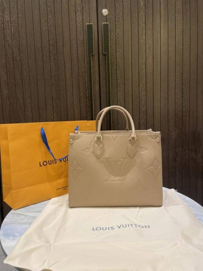 louiis vuitton onthego mm monogram empreinte giant with carry bag & dust cover 969