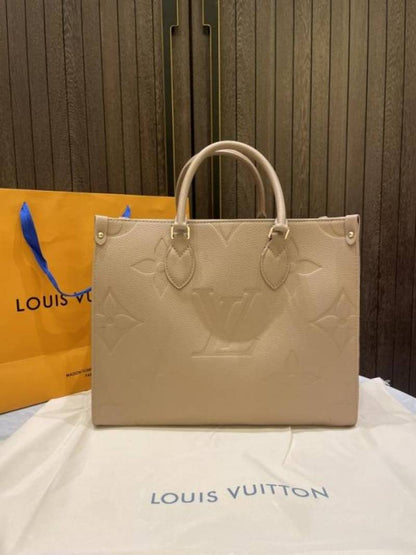 louiis vuitton onthego mm monogram empreinte giant with carry bag & dust cover 969