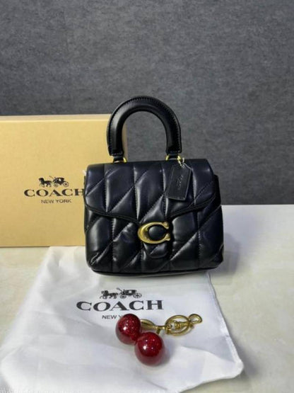 Coac tabby top handle quilted leather with cherry charm with box 884