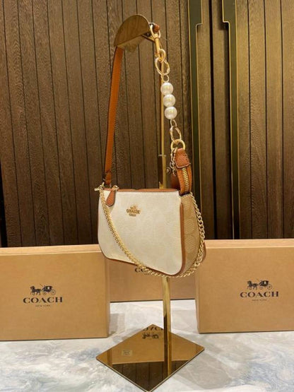coac Nolita shoulder bag with pearl charm with box etc...985