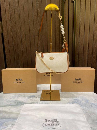coac Nolita shoulder bag with pearl charm with box etc...985