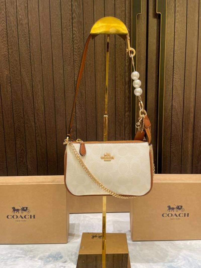 coac Nolita shoulder bag with pearl charm with box etc...985