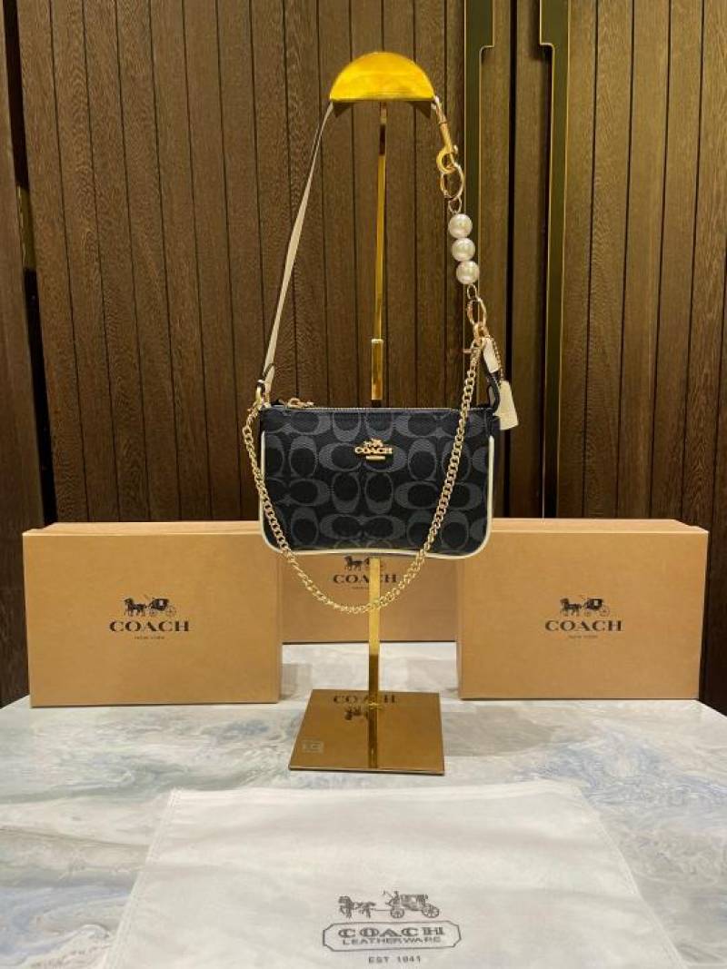 coac Nolita shoulder bag with pearl charm with box etc...979
