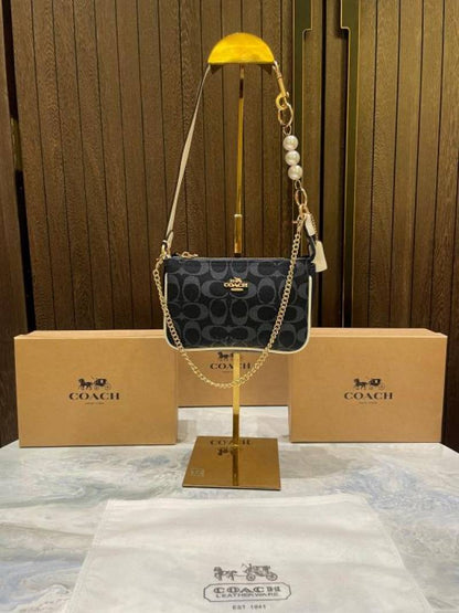 coac Nolita shoulder bag with pearl charm with box etc...979