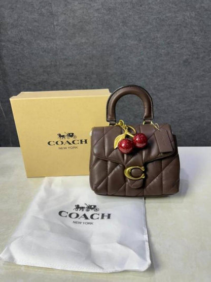 Coac tabby top handle quilted leather with cherry charm with box 882