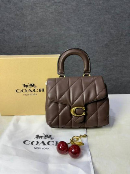 Coac tabby top handle quilted leather with cherry charm with box 882