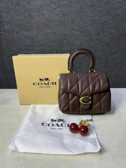 Coac tabby top handle quilted leather with cherry charm with box 882