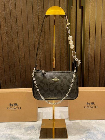coac Nolita shoulder bag with pearl charm with box etc...982