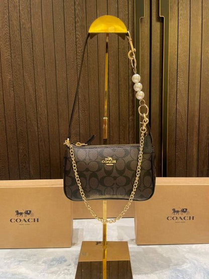 coac Nolita shoulder bag with pearl charm with box etc...984