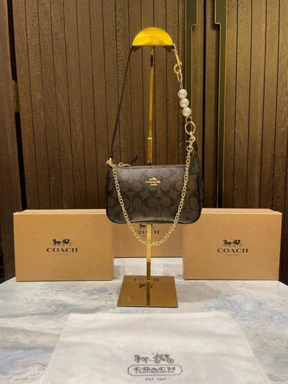 coac Nolita shoulder bag with pearl charm with box etc...984
