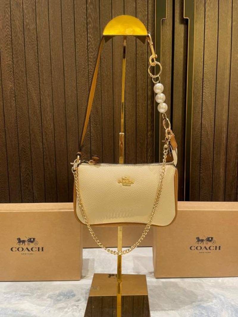 coac Nolita shoulder bag with pearl charm with box etc...980