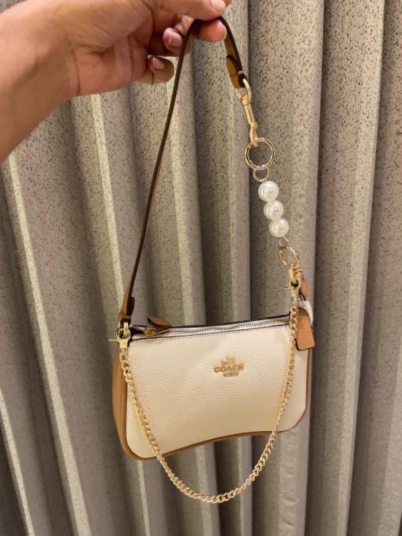 coac Nolita shoulder bag with pearl charm with box etc...980