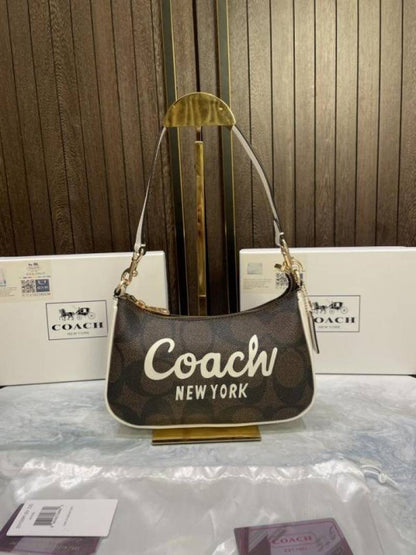 Coac teri mini crossbody bag in signature canvas with graphic & original box 731