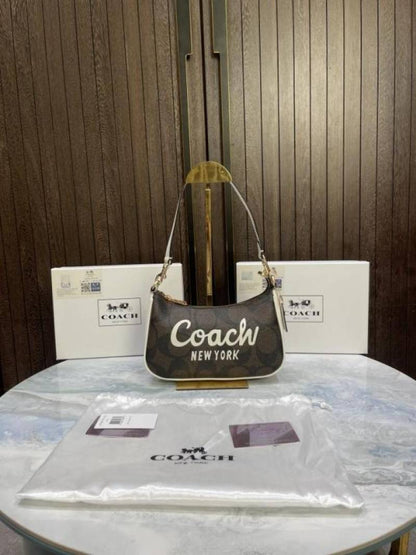 Coac teri mini crossbody bag in signature canvas with graphic & original box 731