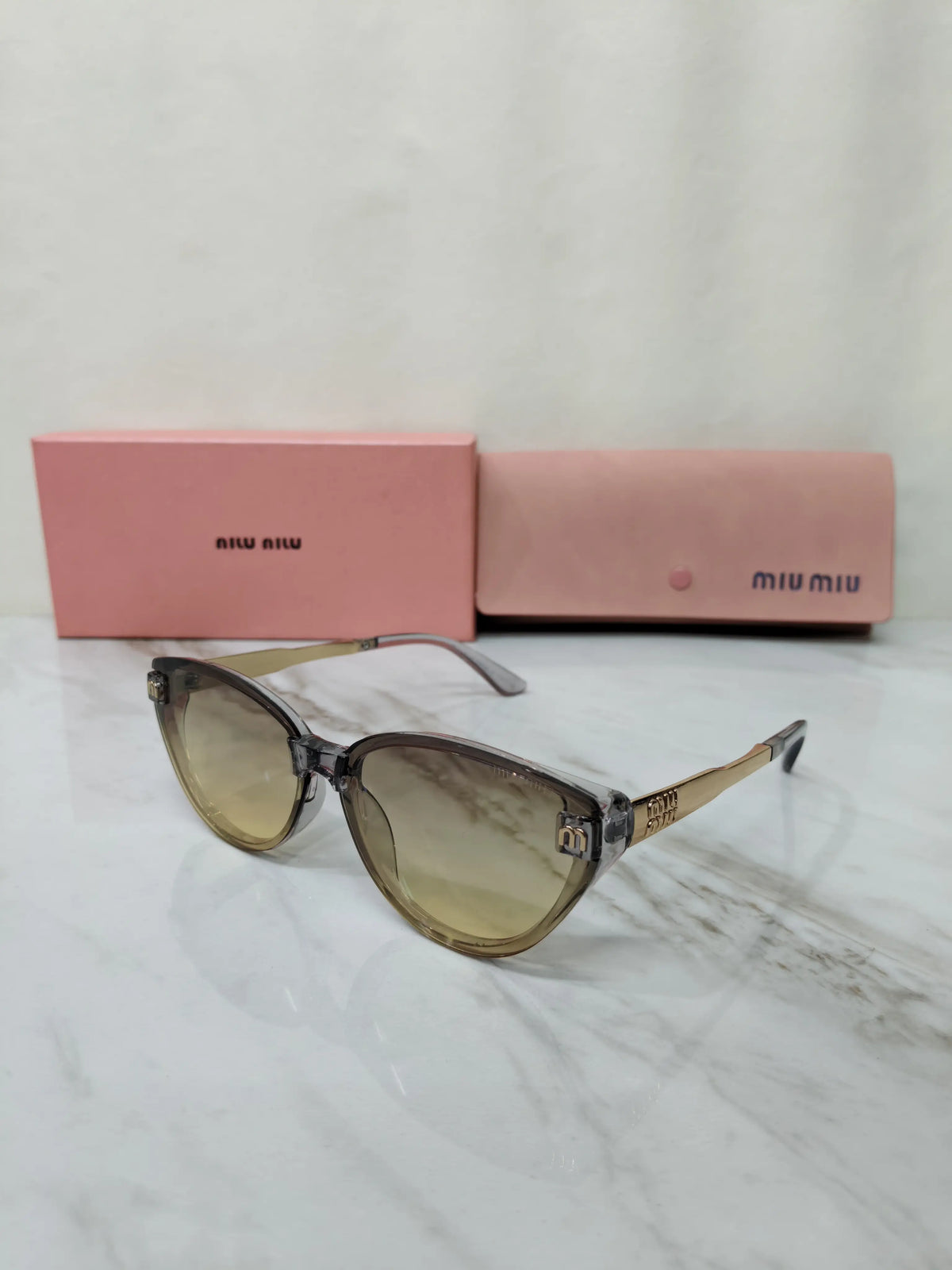 MIU MIU 18538 SMOKEY TRANSPARENT GREY