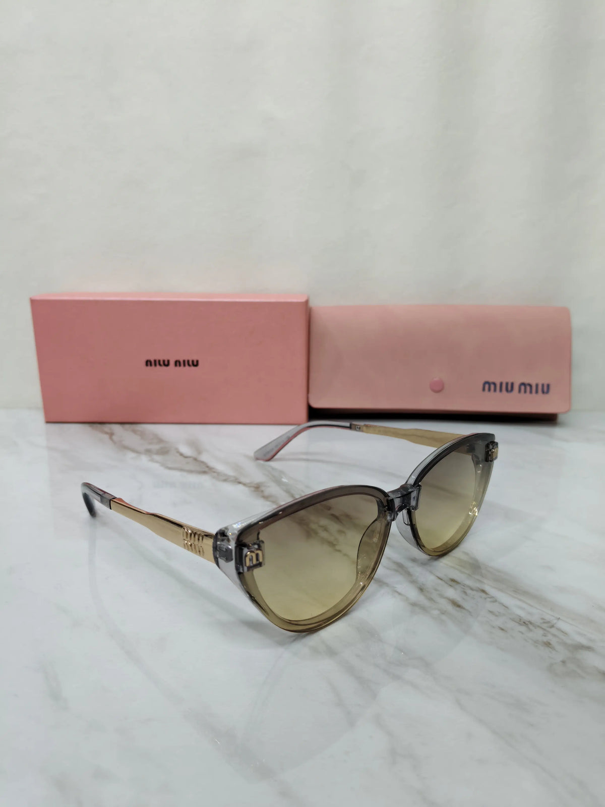 MIU MIU 18538 SMOKEY TRANSPARENT GREY