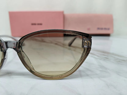 MIU MIU 18538 SMOKEY TRANSPARENT GREY