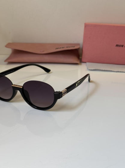 MIU MIU GLASSES